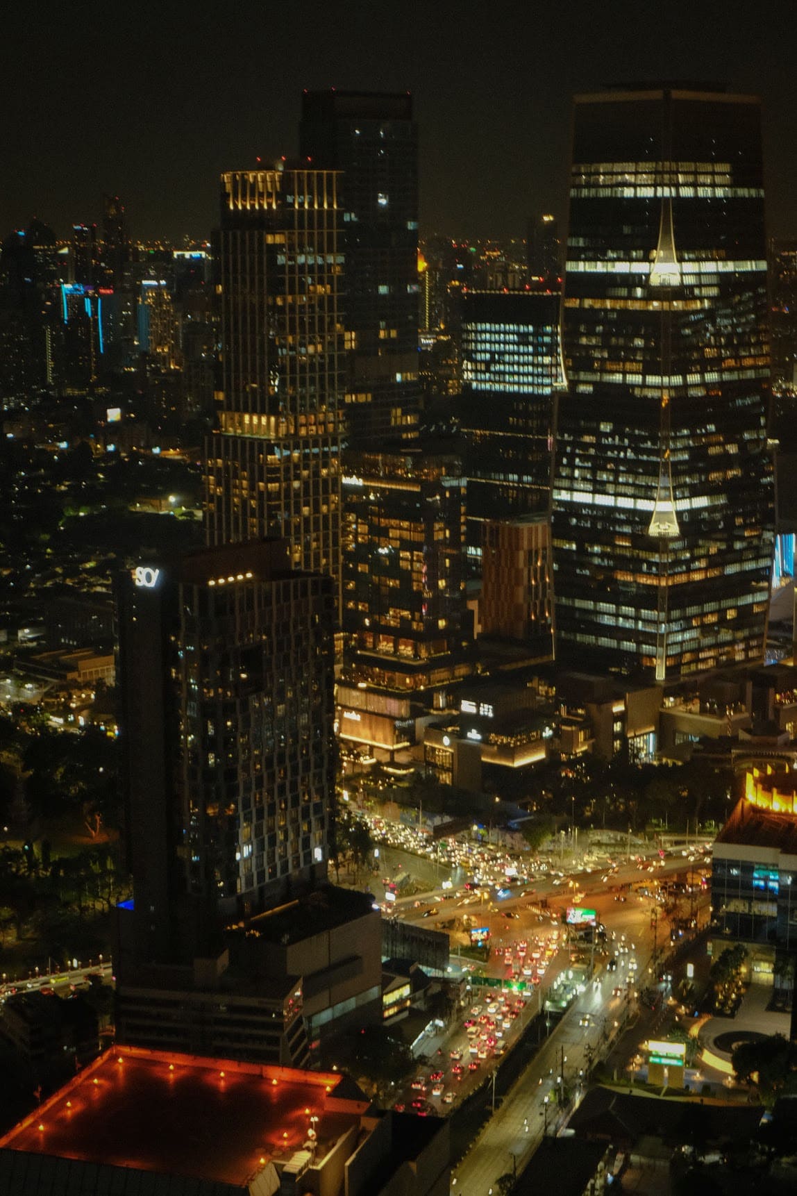 views of skyscrapers and the bangkok city by night