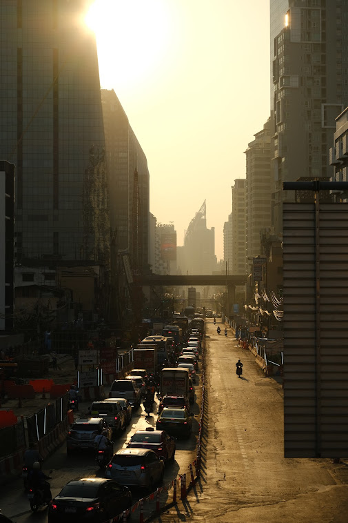 morning traffic in bangkok during sunrise